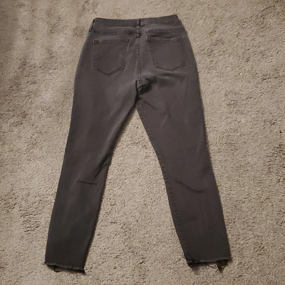 Women's Distressed Mid Rise Rockstar Skinny Jeans - Picture 8 of 8